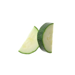 Slices of ripe zucchini on white background, top view Photo of Slices of ripe zucchini on white background, top view