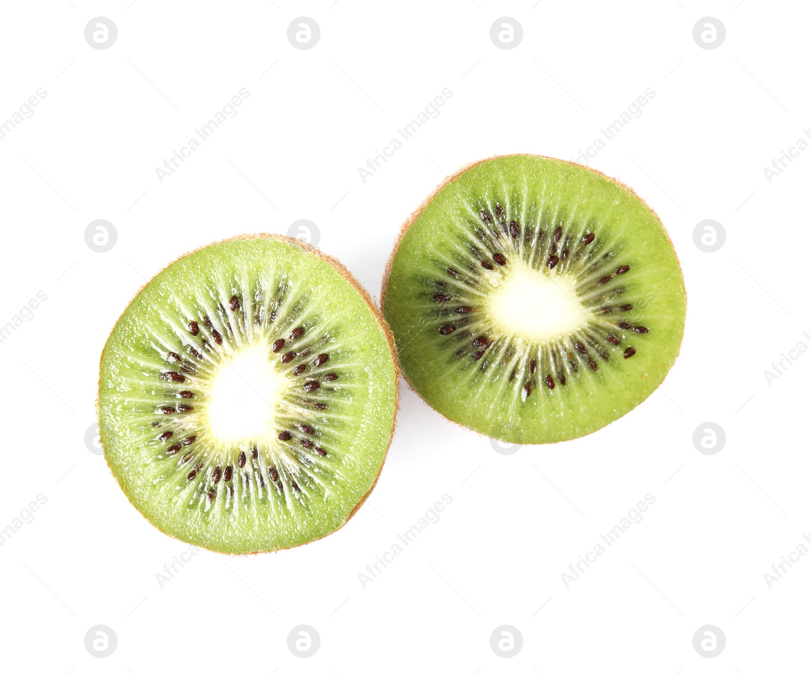 Halves of fresh kiwi on white background, top view Photo of Halves of fresh kiwi on white background, top view