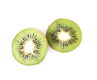 Halves of fresh kiwi on white background, top view Photo of Halves of fresh kiwi on white background, top view