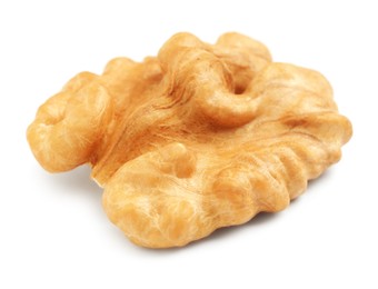 Half of ripe walnut isolated on white Photo of Half of ripe walnut isolated on white