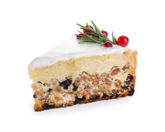 Slice of traditional Christmas cake decorated with rosemary and cranberries isolated on white Photo of Slice of traditional Christmas cake decorated with rosemary and cranberries isolated on white