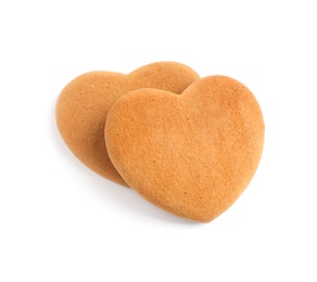 Tasty heart shaped gingerbread cookies isolated on white Photo of Tasty heart shaped gingerbread cookies isolated on white