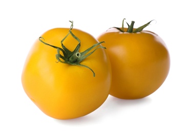 Delicious ripe yellow tomatoes isolated on white Photo of Delicious ripe yellow tomatoes isolated on white