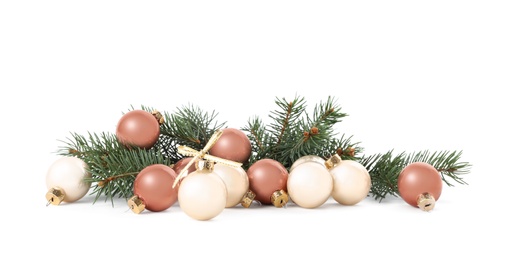 Beautiful Christmas balls and fir branches on white background Photo of Beautiful Christmas balls and fir branches on white background
