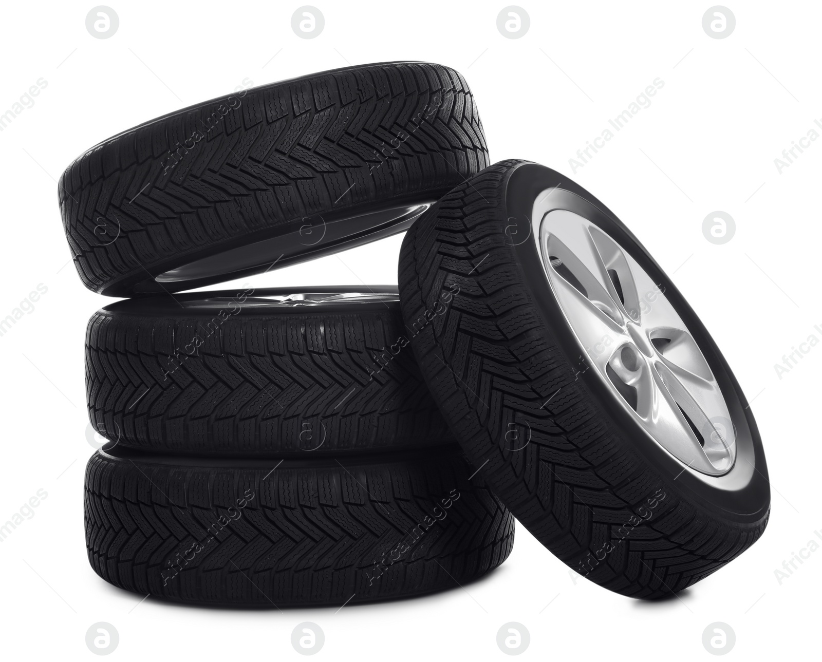 Photo of Set of wheels with winter tires on white background