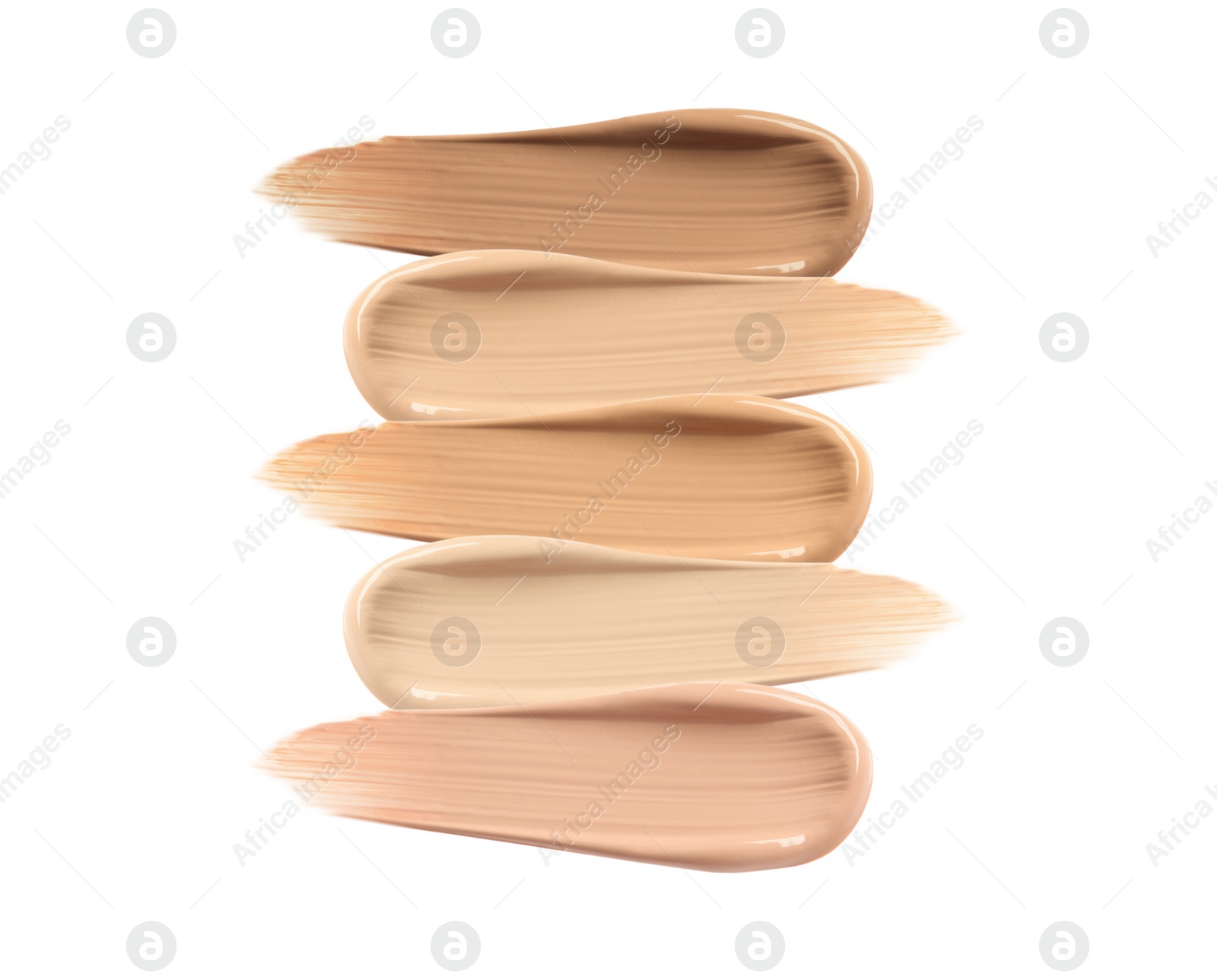 Different shades of liquid skin foundation on white background, top view Image of Different shades of liquid skin foundation on white background, top view