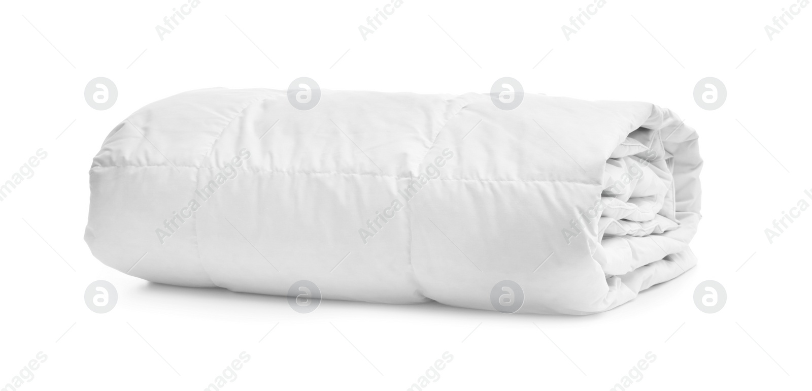 Folded soft blanket on white background. Household textile Photo of Folded soft blanket on white background. Household textile