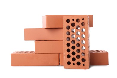 Many red bricks on white background. Building material Photo of Many red bricks on white background. Building material