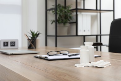 Photo of Modern doctor's workplace in office. Interior design