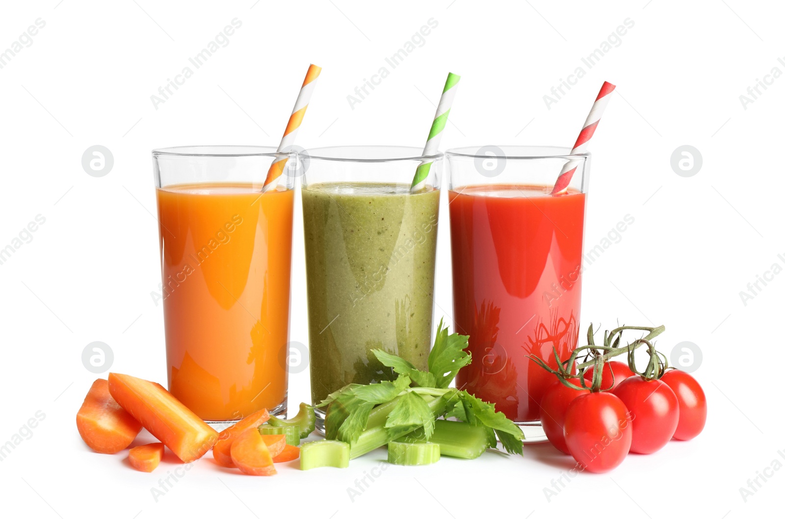 Delicious vegetable juices and fresh ingredients on white background Photo of Delicious vegetable juices and fresh ingredients on white background