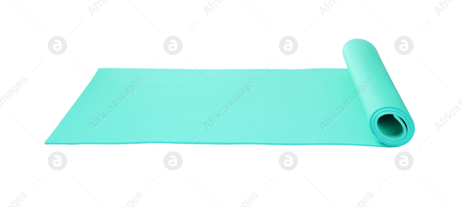 Bright turquoise camping mat isolated on white Photo of Bright turquoise camping mat isolated on white