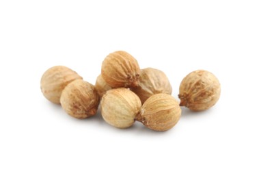 Heap of dried coriander seeds on white background, closeup Photo of Heap of dried coriander seeds on white background, closeup