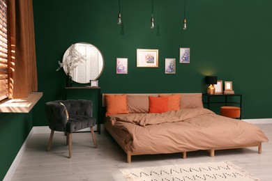 Stylish bedroom with modern furniture. Interior design Photo of Stylish bedroom with modern furniture. Interior design