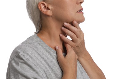 Mature woman doing thyroid self examination on white background, closeup Photo of Mature woman doing thyroid self examination on white background, closeup