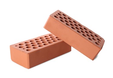 Two red bricks isolated on white. Building material Photo of Two red bricks isolated on white. Building material