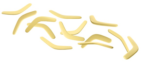 Many yellow boomerangs flying on white background. Banner design Image of Many yellow boomerangs flying on white background. Banner design