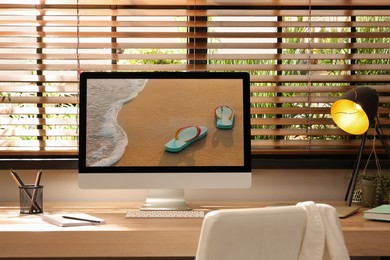 Comfortable workplace near window in room. Interior design Photo of Comfortable workplace near window in room. Interior design