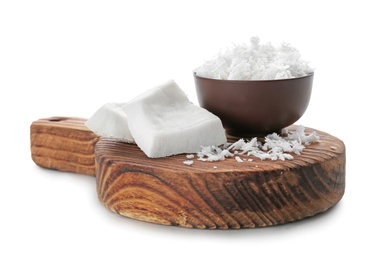 Composition with fresh coconut flakes on white background Photo of Composition with fresh coconut flakes on white background
