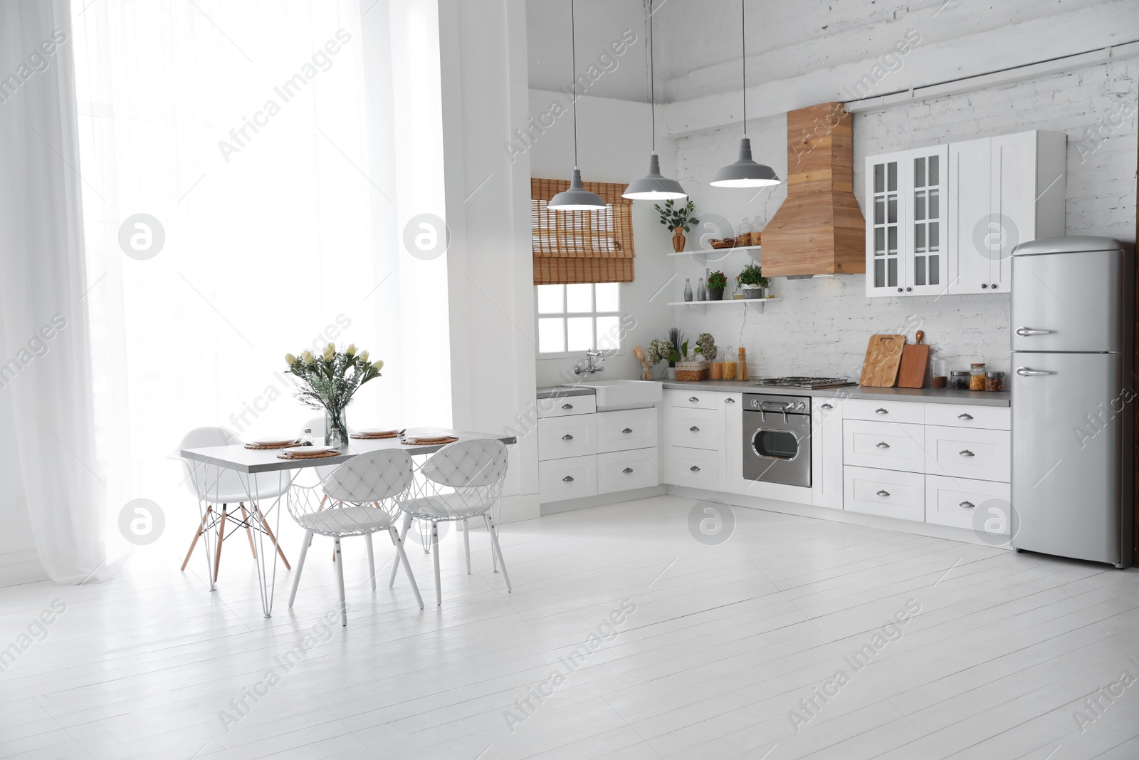 Beautiful kitchen interior with new stylish furniture Photo of Beautiful kitchen interior with new stylish furniture