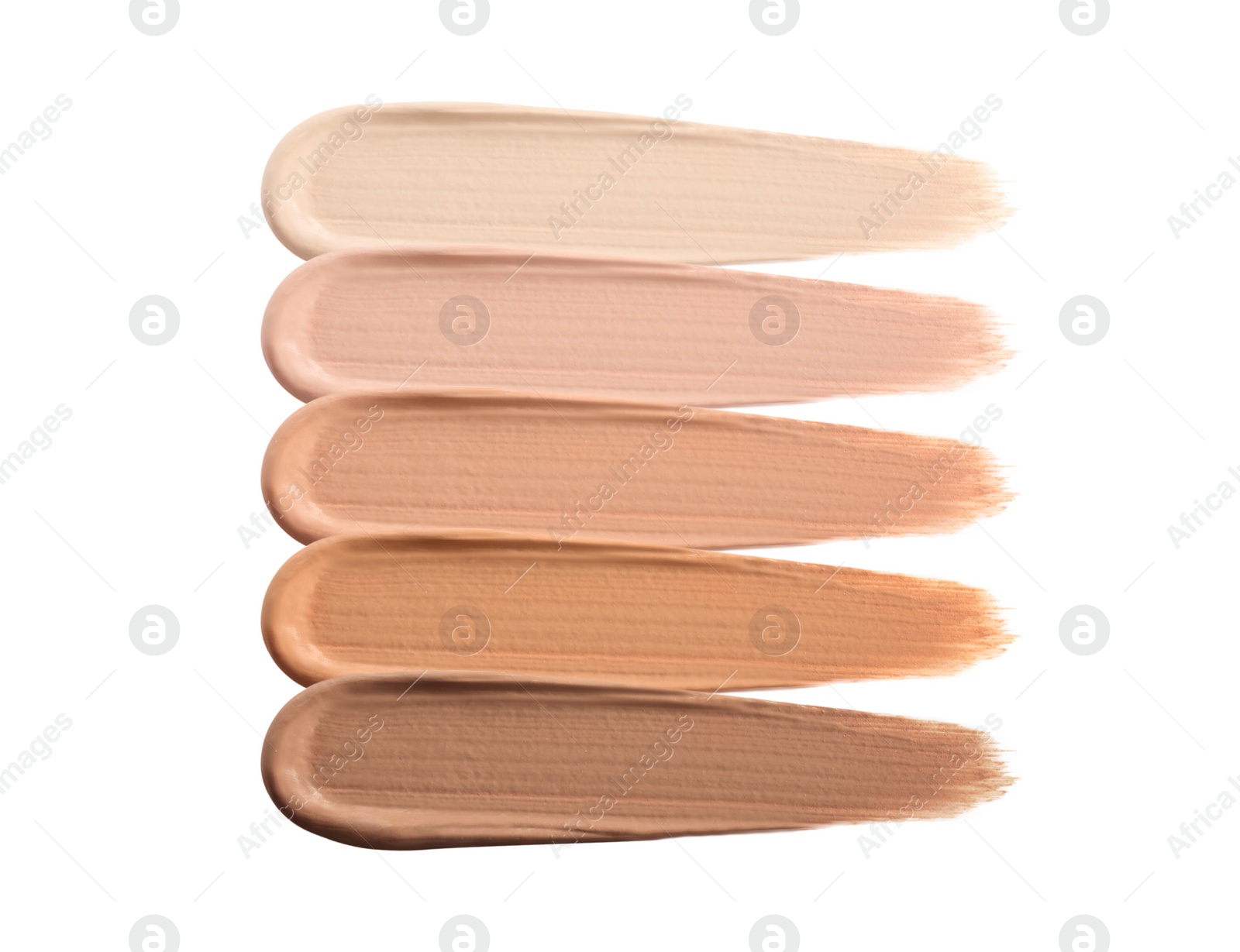 Different shades of liquid skin foundation on white background, top view Image of Different shades of liquid skin foundation on white background, top view