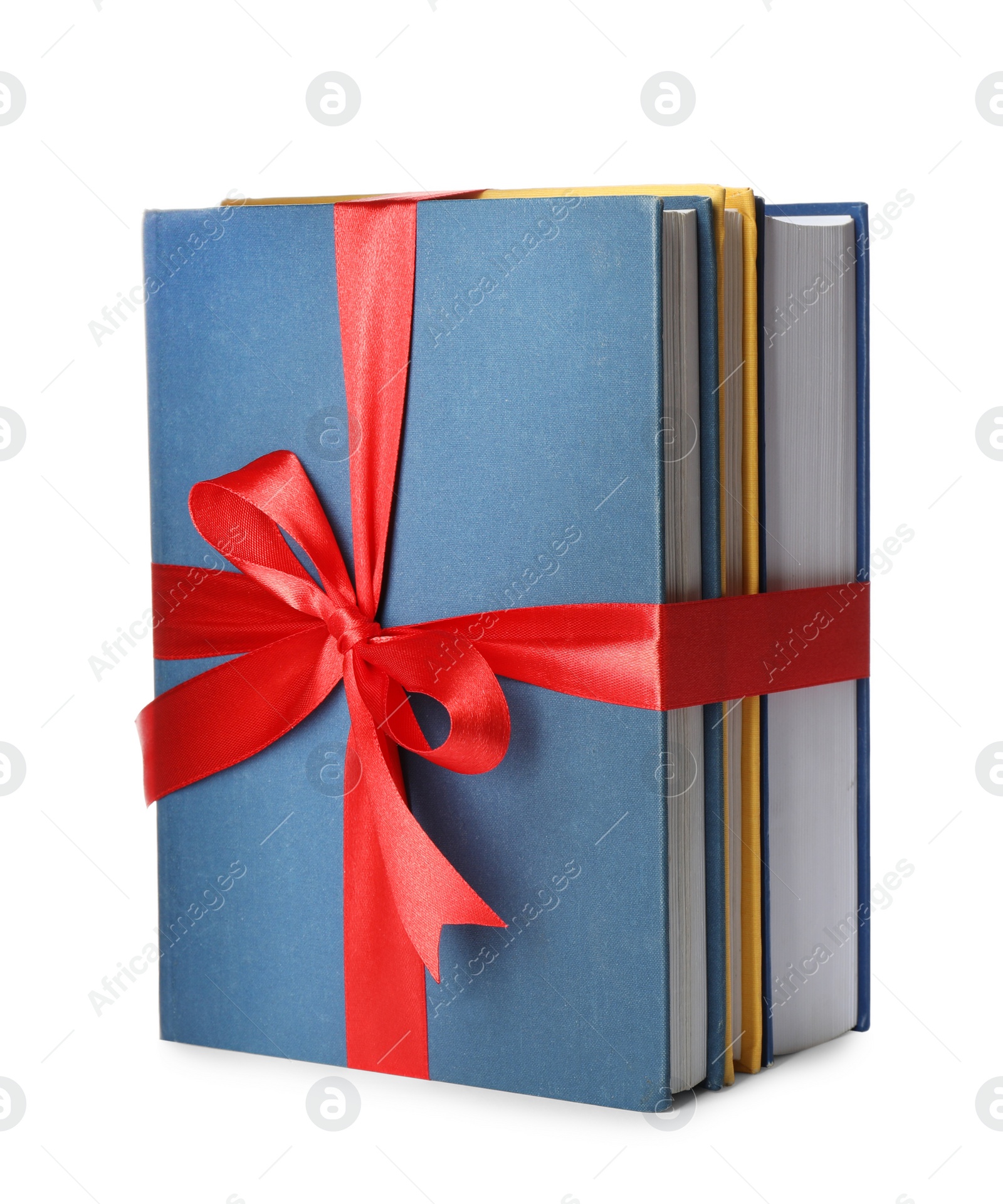 Different books tied with red ribbon isolated on white Photo of Different books tied with red ribbon isolated on white