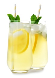 Natural lemonade with mint on white background. Summer refreshing drink Photo of Natural lemonade with mint on white background. Summer refreshing drink