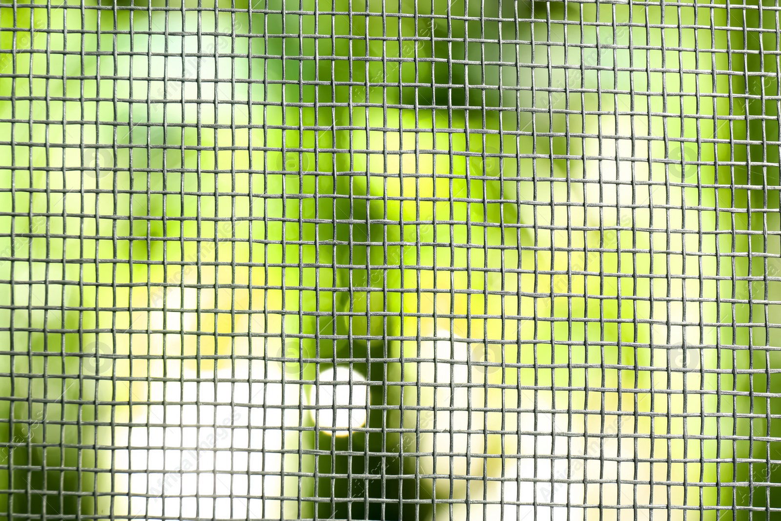 Insect screen for window against blurred background, closeup Photo of Insect screen for window against blurred background, closeup
