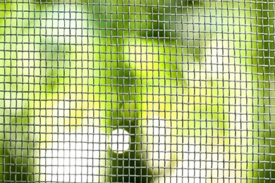 Insect screen for window against blurred background, closeup Photo of Insect screen for window against blurred background, closeup