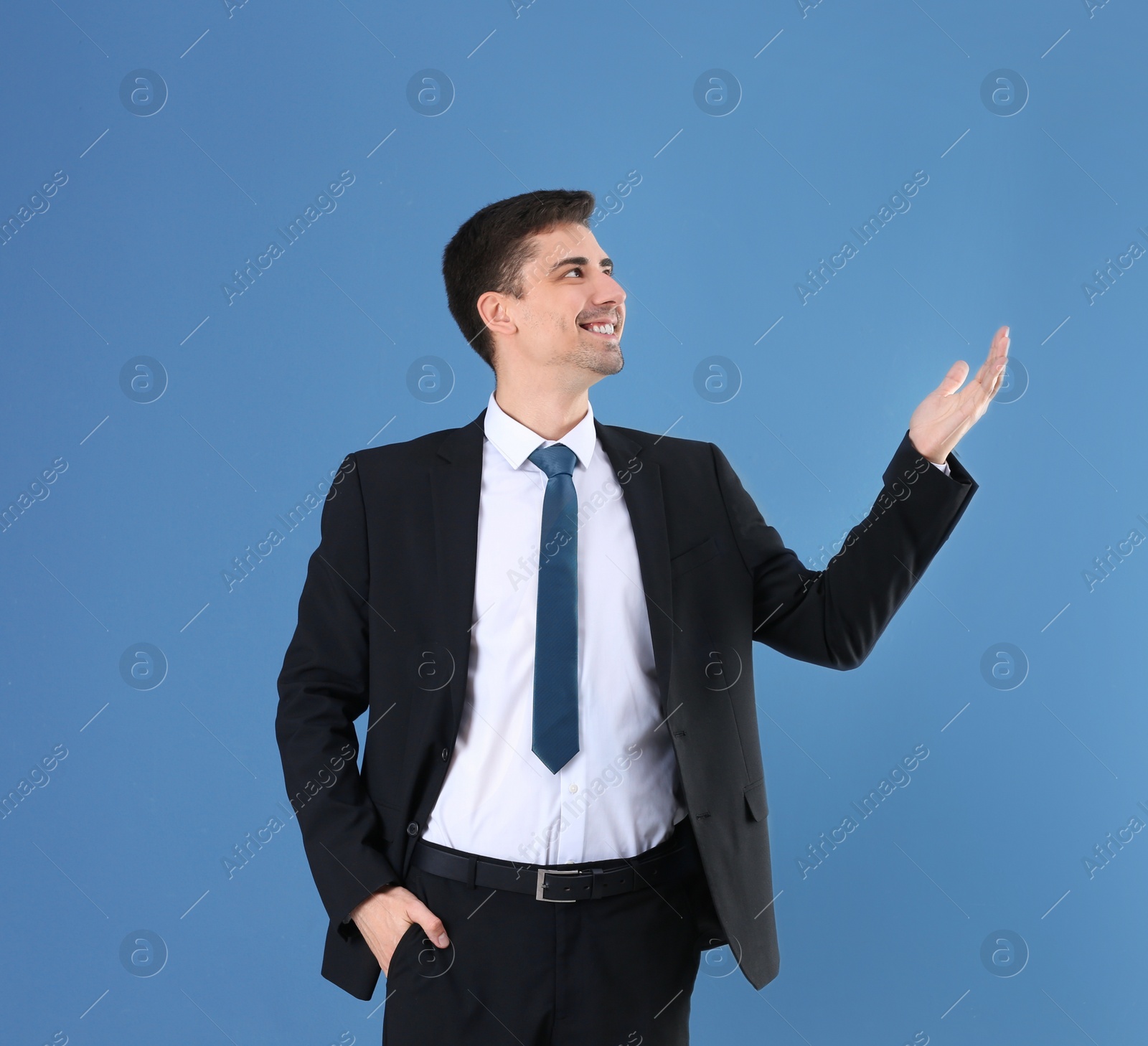 Business trainer explaining seminar on color background Photo of Business trainer explaining seminar on color background