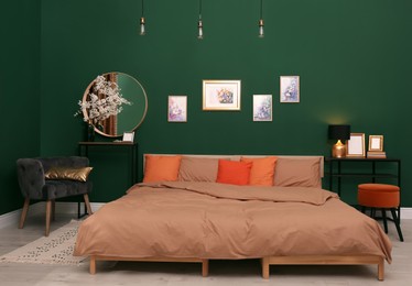 Stylish bedroom with modern furniture. Interior design Photo of Stylish bedroom with modern furniture. Interior design