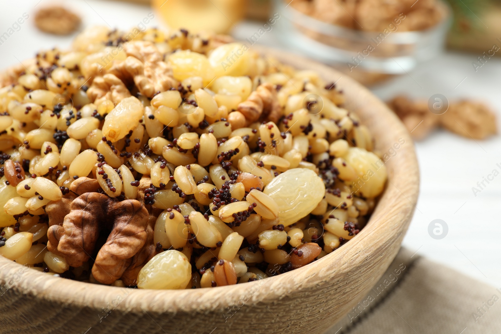 Traditional Christmas slavic dish kutia in bowl on table, closeup Photo of Traditional Christmas slavic dish kutia in bowl on table, closeup