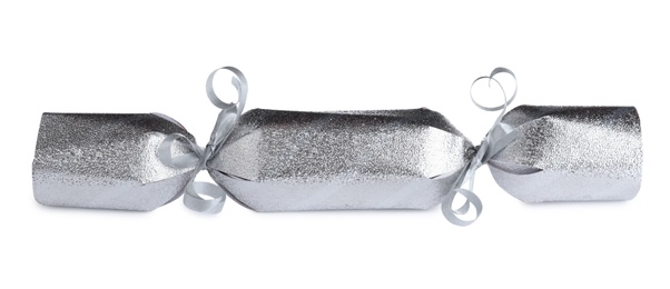 Shiny silver Christmas cracker isolated on white, closeup Photo of Shiny silver Christmas cracker isolated on white, closeup
