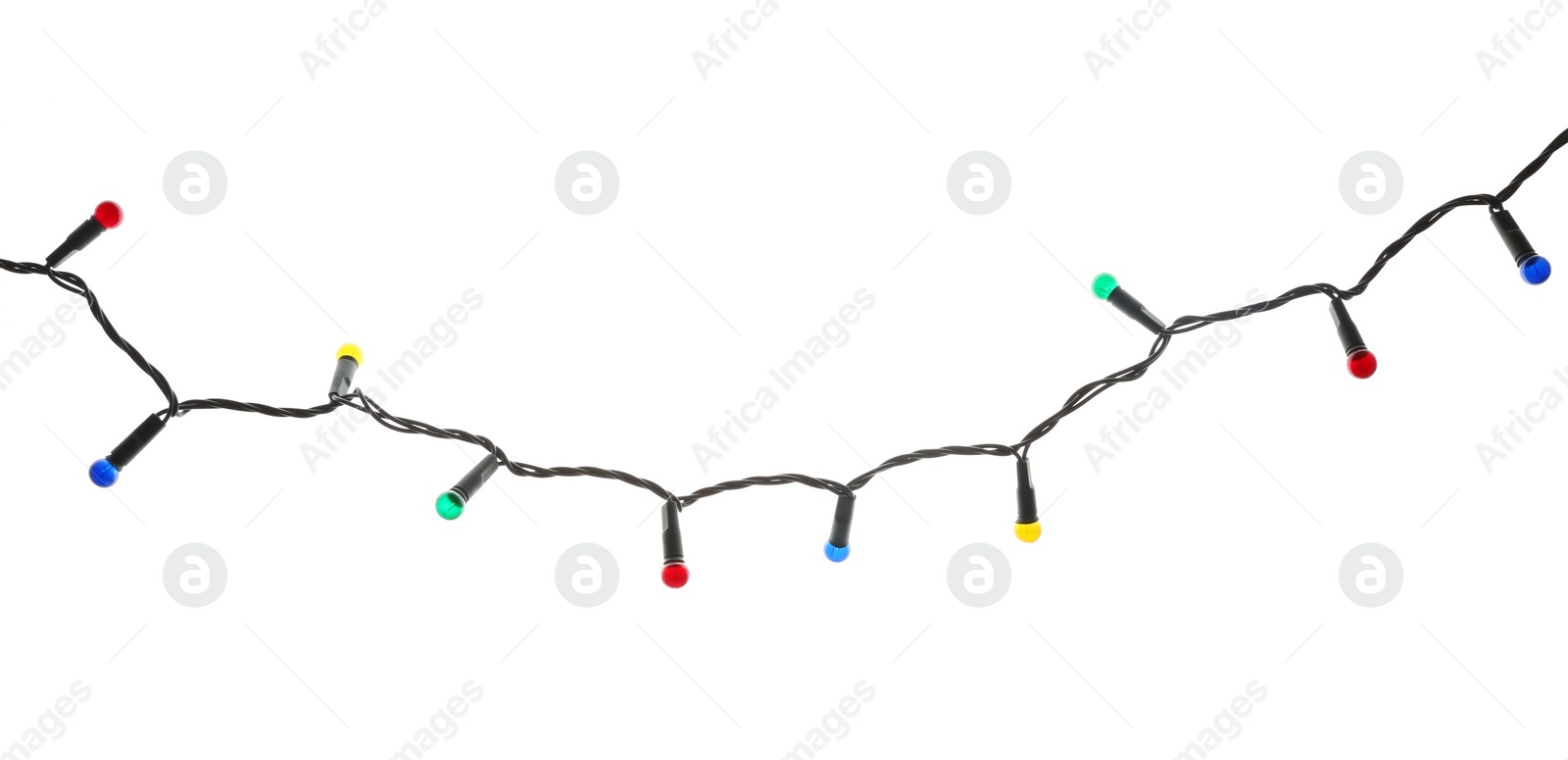 Beautiful Christmas lights on white background. Festive decoration Photo of Beautiful Christmas lights on white background. Festive decoration