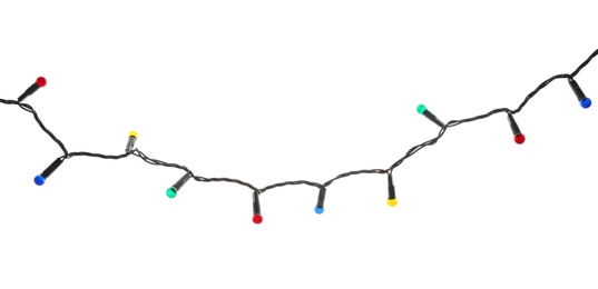 Beautiful Christmas lights on white background. Festive decoration Photo of Beautiful Christmas lights on white background. Festive decoration