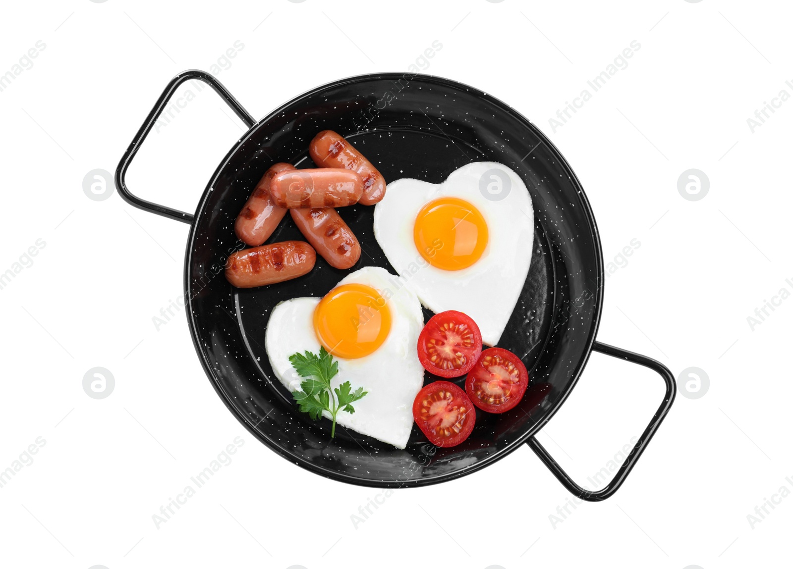 Romantic breakfast with fried sausages and heart shaped eggs isolated on white, top view. Valentine's day celebration Photo of Romantic breakfast with fried sausages and heart shaped eggs isolated on white, top view. Valentine's day celebration