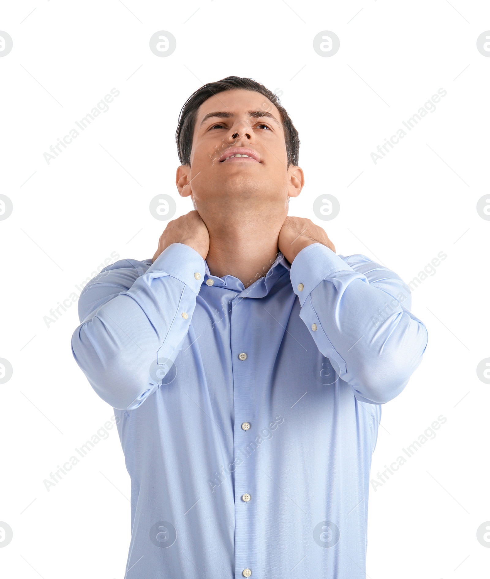 Young man suffering from neck pain on white background Photo of Young man suffering from neck pain on white background