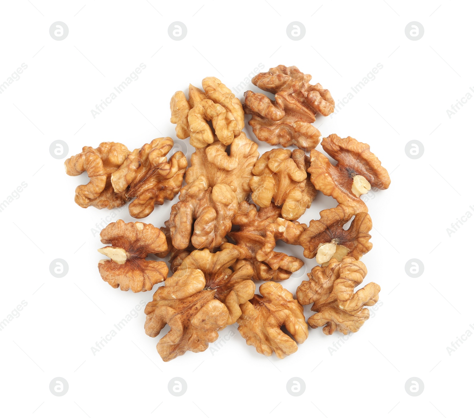 Pile of peeled walnuts on white background, top view Photo of Pile of peeled walnuts on white background, top view