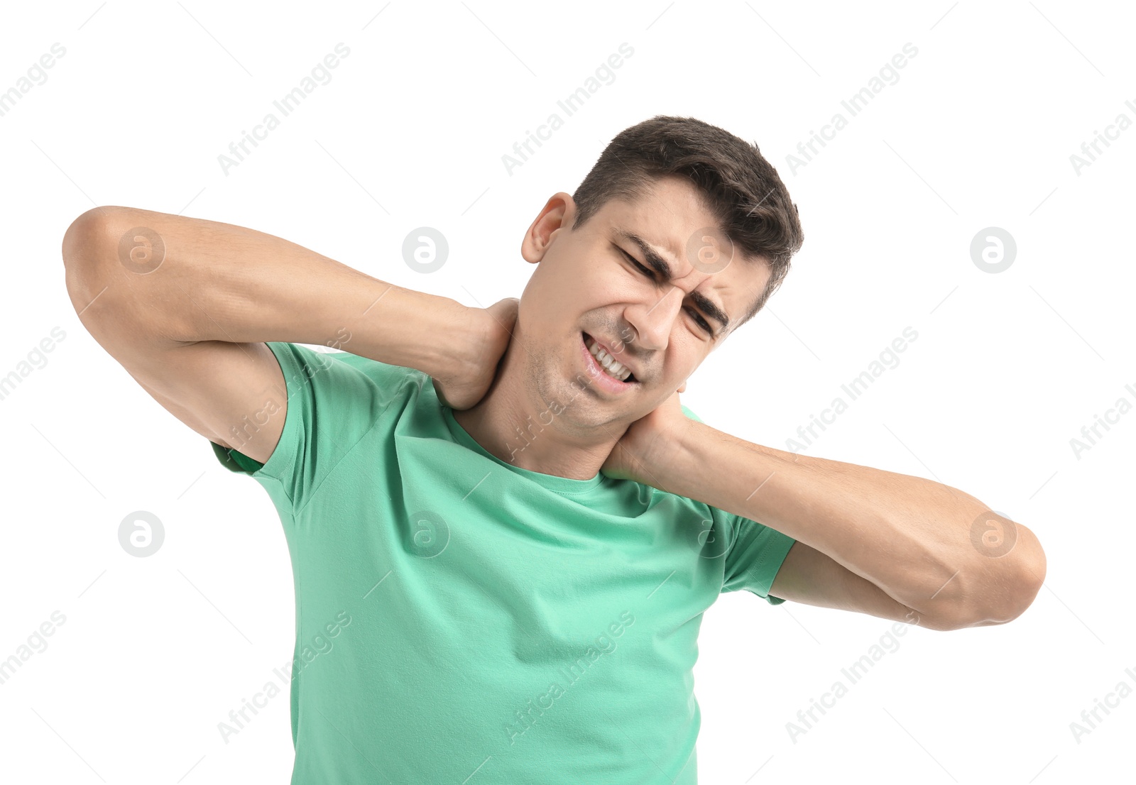 Young man suffering from neck pain on white background Photo of Young man suffering from neck pain on white background
