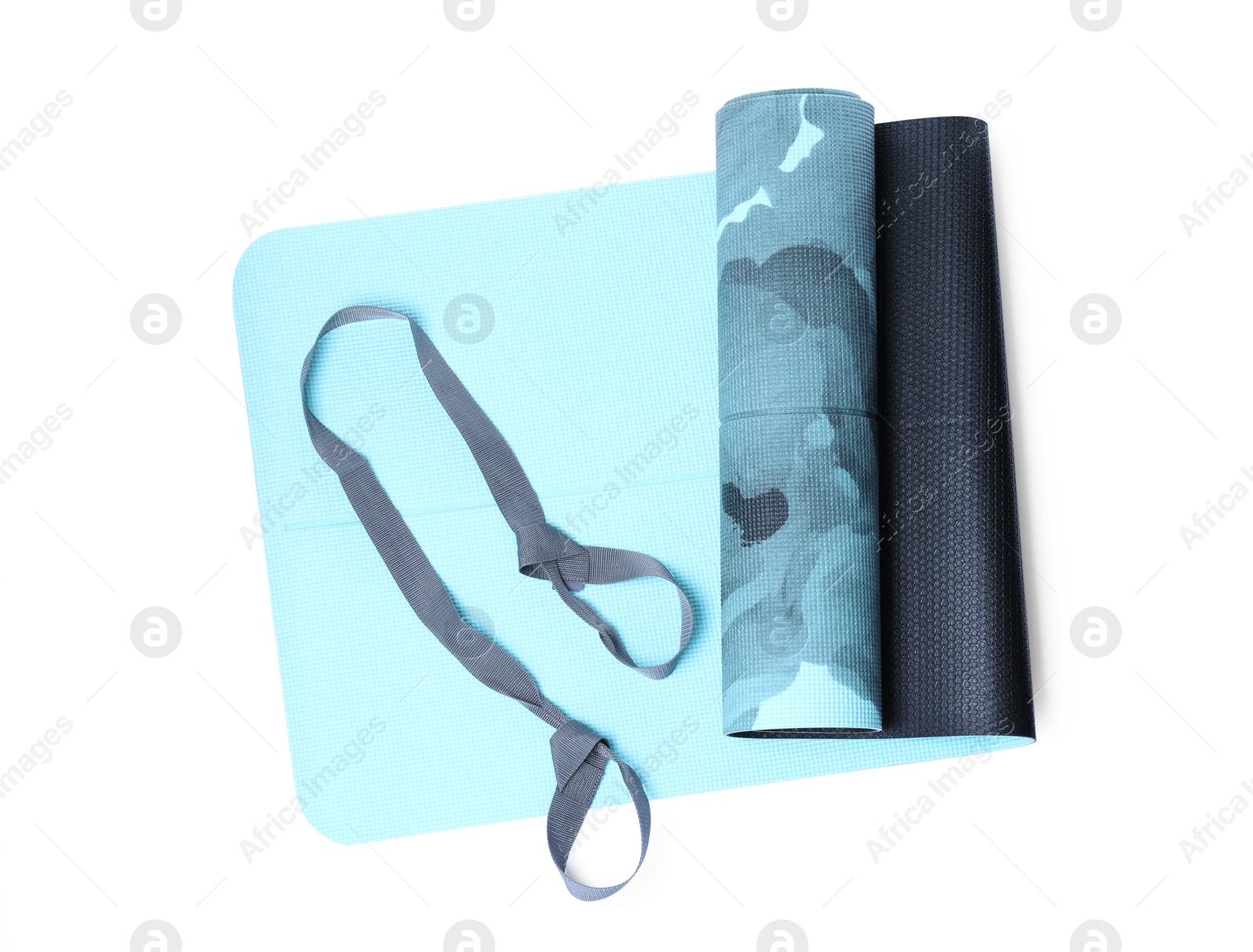 Light blue camping mat with strap isolated on white, top view Photo of Light blue camping mat with strap isolated on white, top view