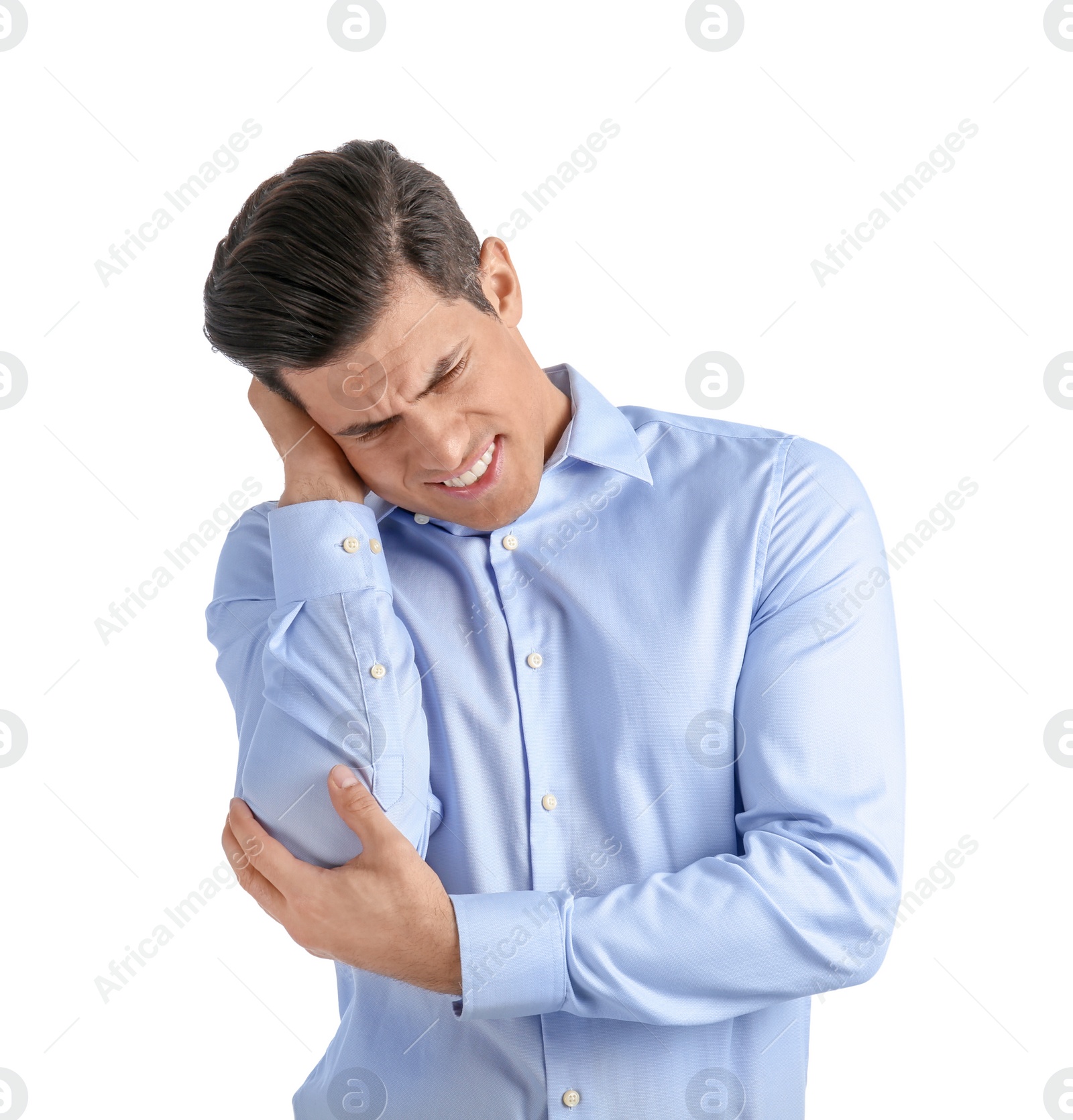 Young man suffering from pain in elbow on white background Photo of Young man suffering from pain in elbow on white background