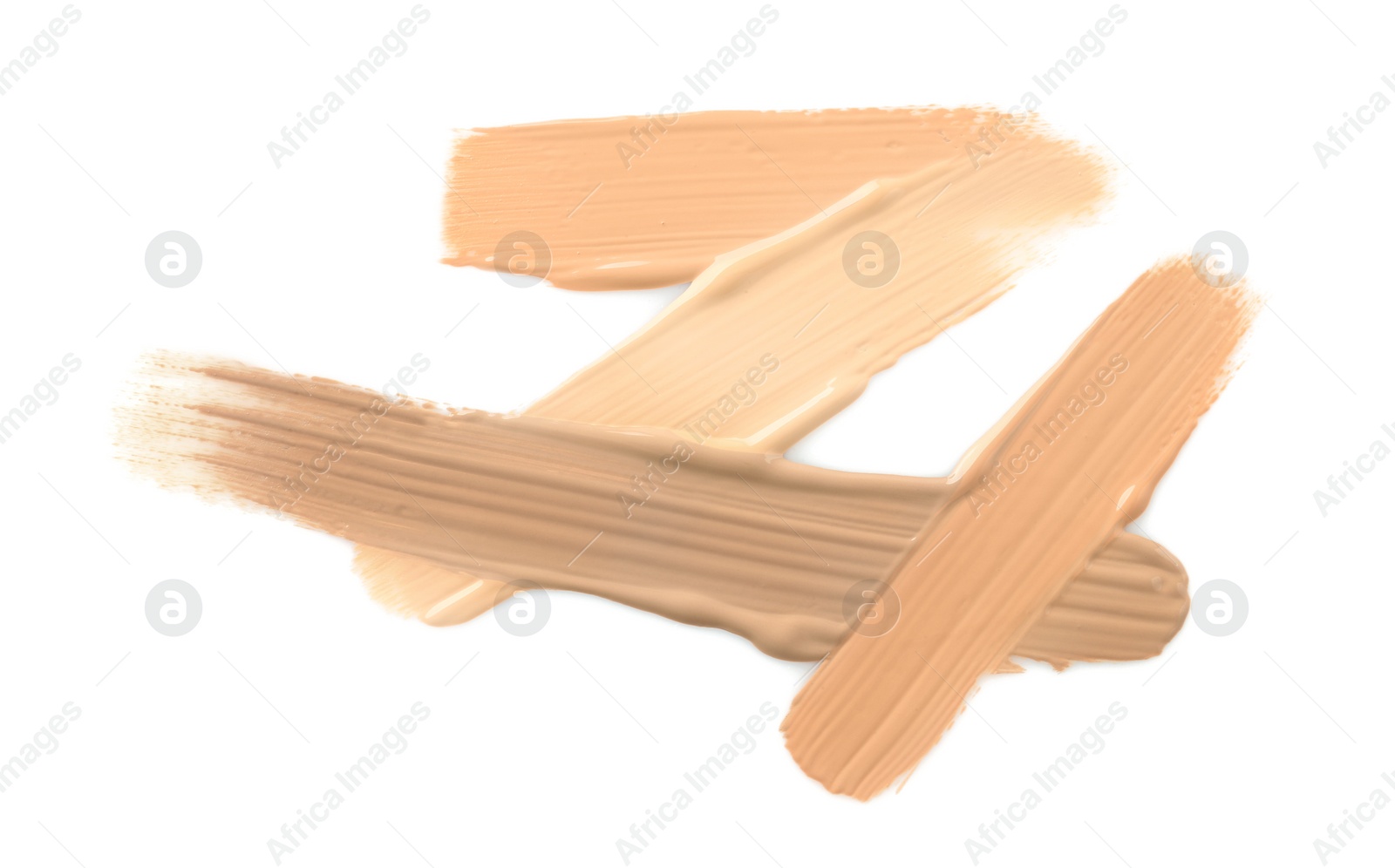 Samples of liquid skin foundations on white background, top view Photo of Samples of liquid skin foundations on white background, top view