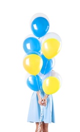 Woman hiding behind balloons in colors of Ukrainian flag on white background Image of Woman hiding behind balloons in colors of Ukrainian flag on white background