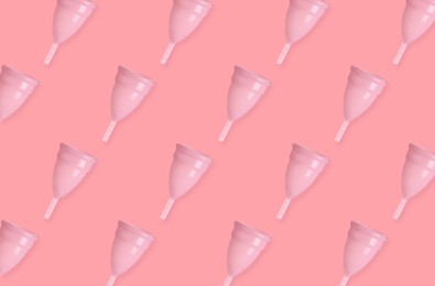 Image of Many menstrual cups on pink background, flat lay. Pattern design