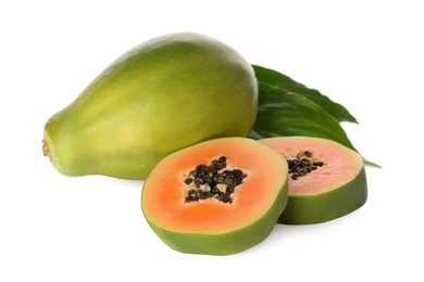 Fresh ripe papaya fruits with green leaves on white background Photo of Fresh ripe papaya fruits with green leaves on white background