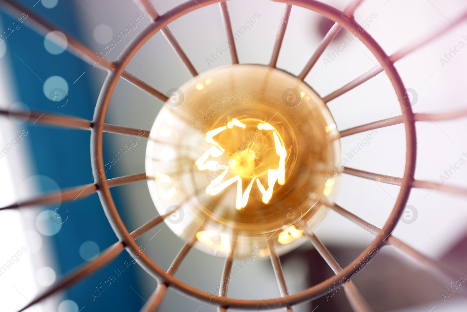 Stylish metallic pendant lamp with Edison light bulb indoors, bottom view Image of Stylish metallic pendant lamp with Edison light bulb indoors, bottom view