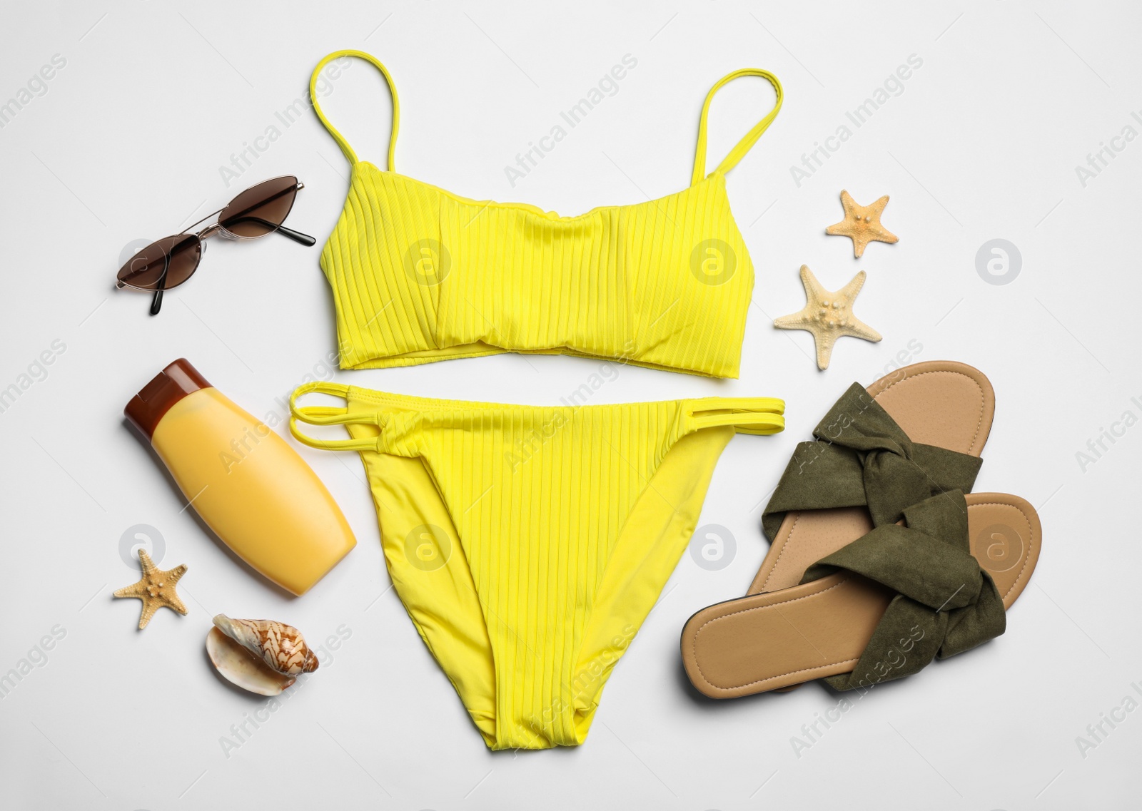 Flat lay composition with beach objects on white background Photo of Flat lay composition with beach objects on white background
