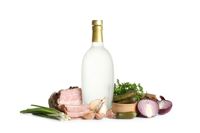 Russian vodka and different appetizers isolated on white Photo of Russian vodka and different appetizers isolated on white