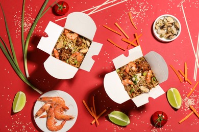 Flat lay composition with noodle wok and ingredients on red background Photo of Flat lay composition with noodle wok and ingredients on red background