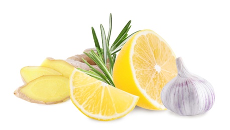 Ginger root, lemon, garlic and rosemary on white background Image of Ginger root, lemon, garlic and rosemary on white background