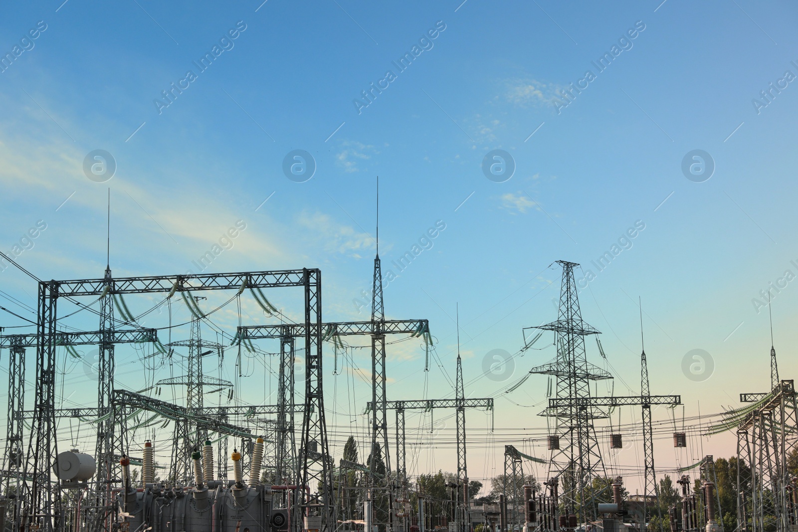 Modern electrical substation outdoors on sunny day Photo of Modern electrical substation outdoors on sunny day